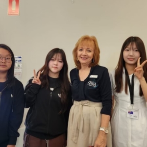 Students with AIIU Staff